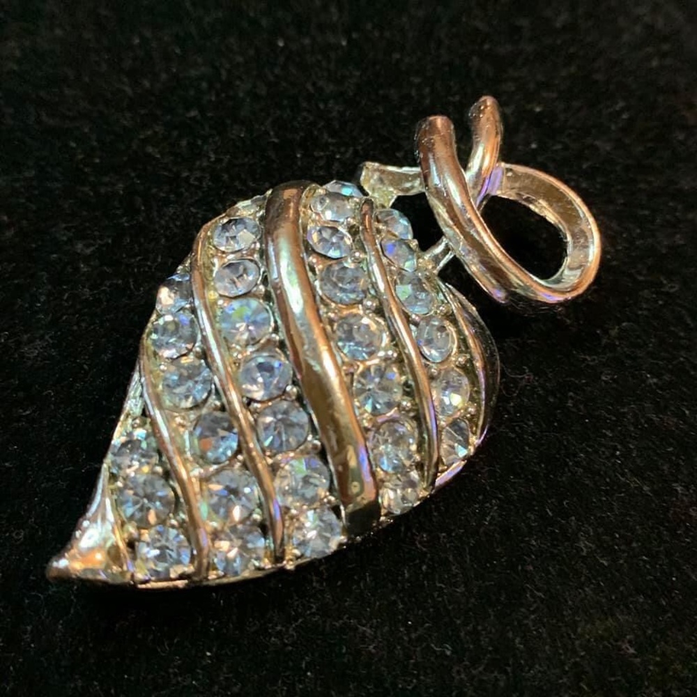 Silver and blue gemstone brooch